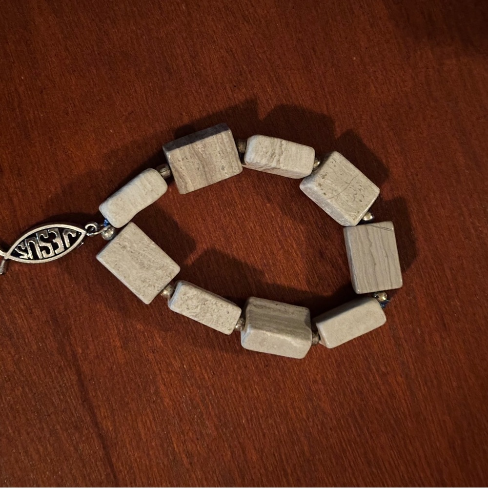 Silver and Gray Beaded Bracelet with Jesus charm